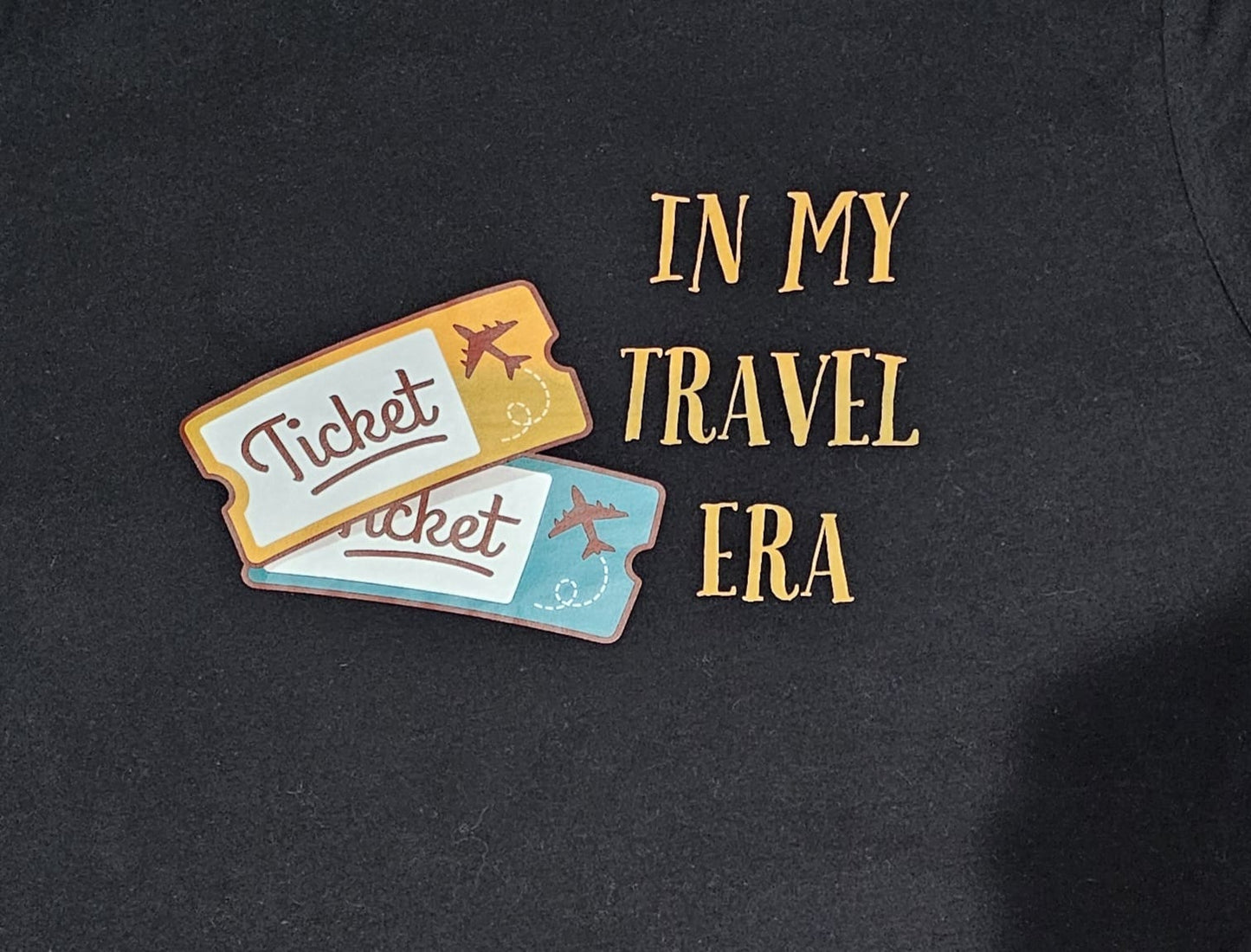 IN MY TRAVEL ERA Loose fit t-shirt black with a unique hand stitching on the sleeve.