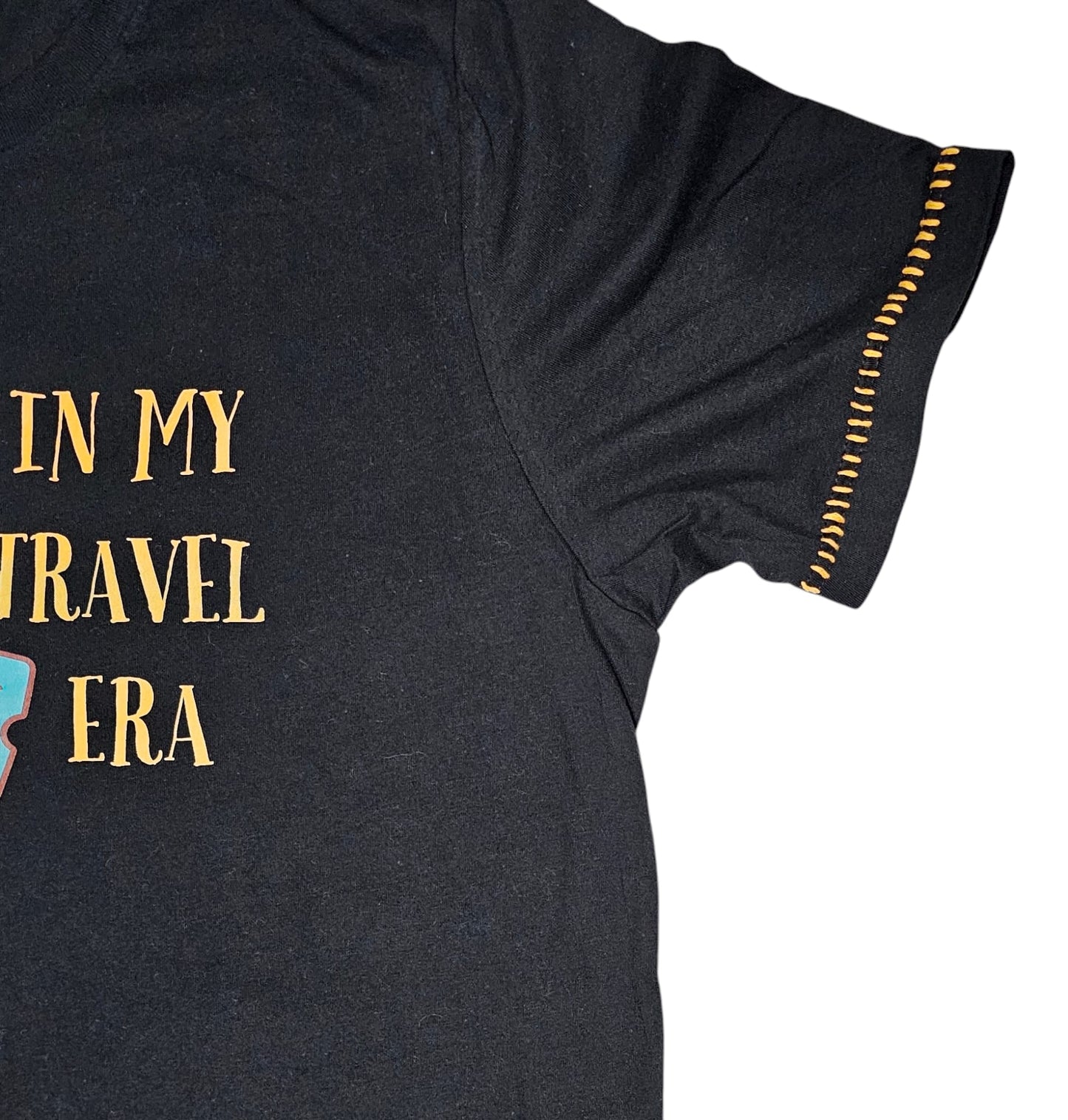 IN MY TRAVEL ERA Loose fit t-shirt black with a unique hand stitching on the sleeve.