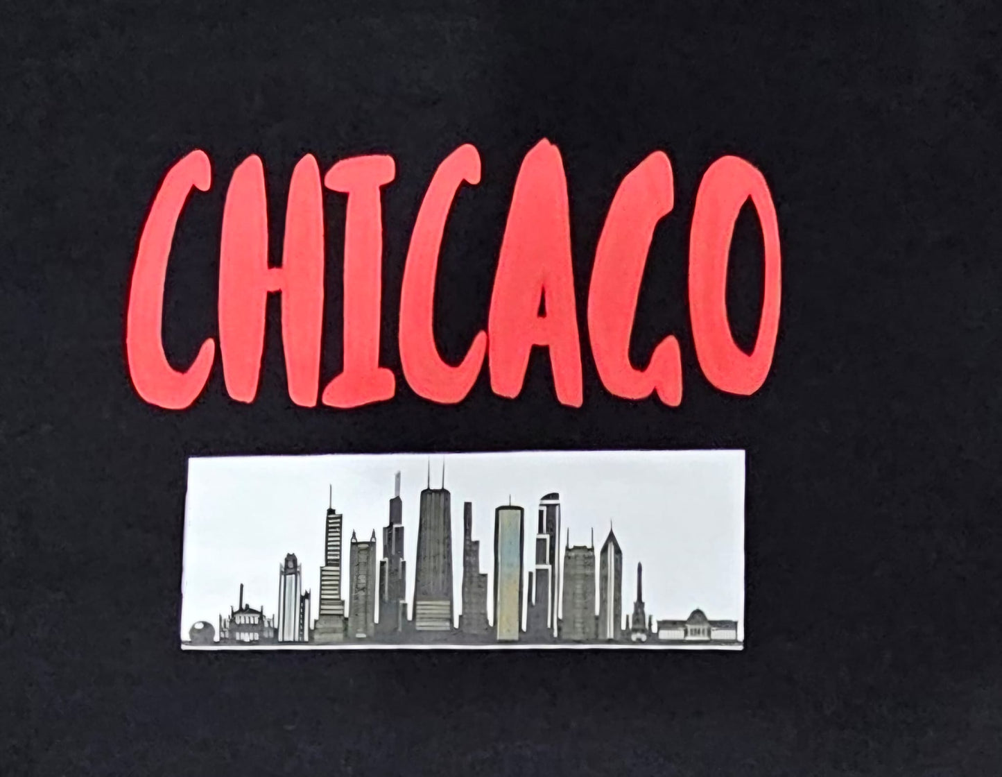 Chicago T-Shirt with a red puff print a unique textured and the beautiful skyline.