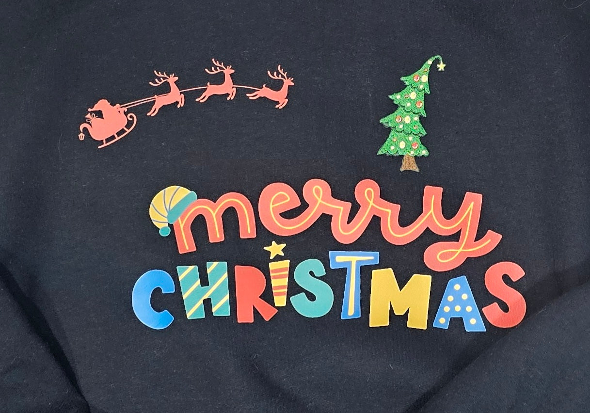 Merry Christmas Hoodie, soft material featuring an embroidered xmas tree patch is the perfect blend.