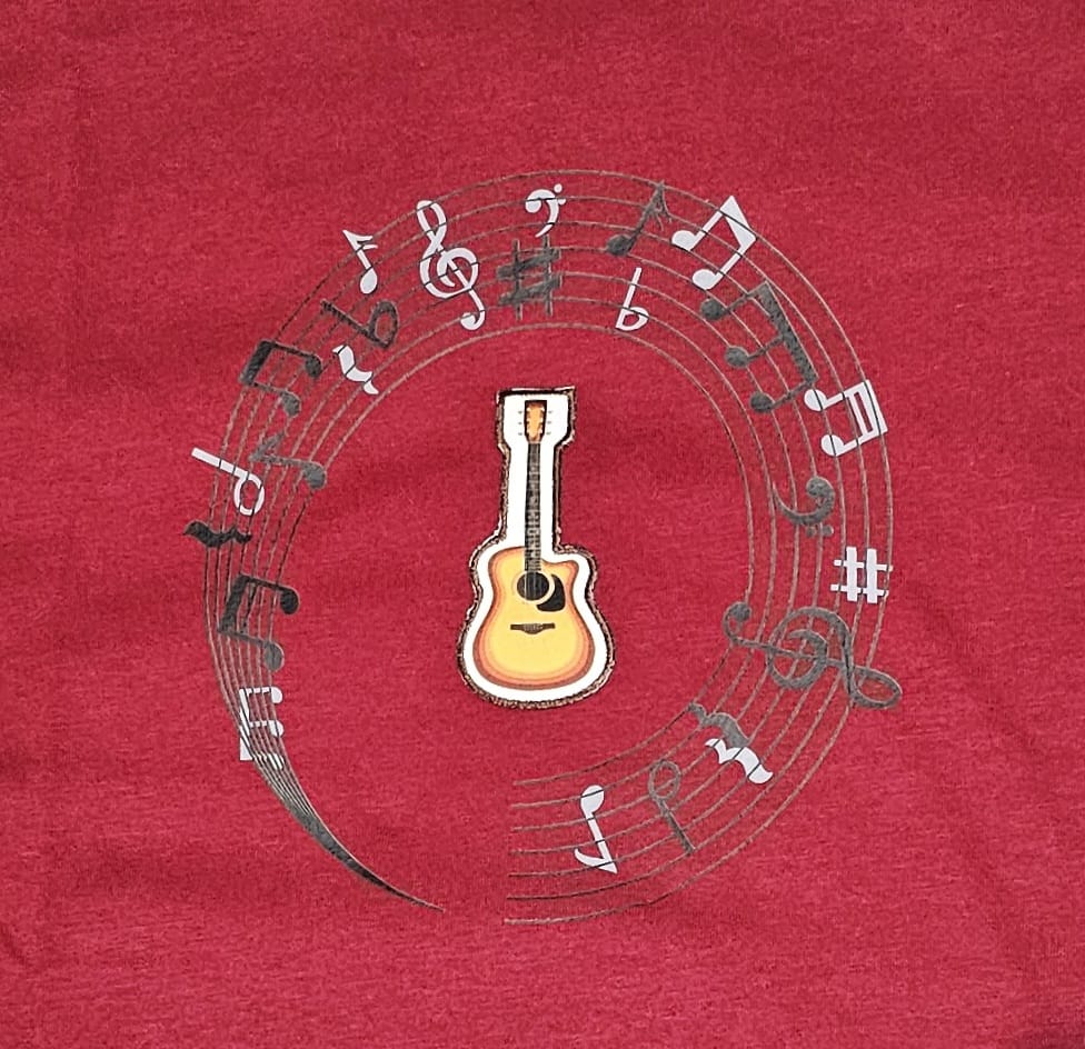 Love music T-Shirt with musical notes and an embroidery guitar patch is loose fit.