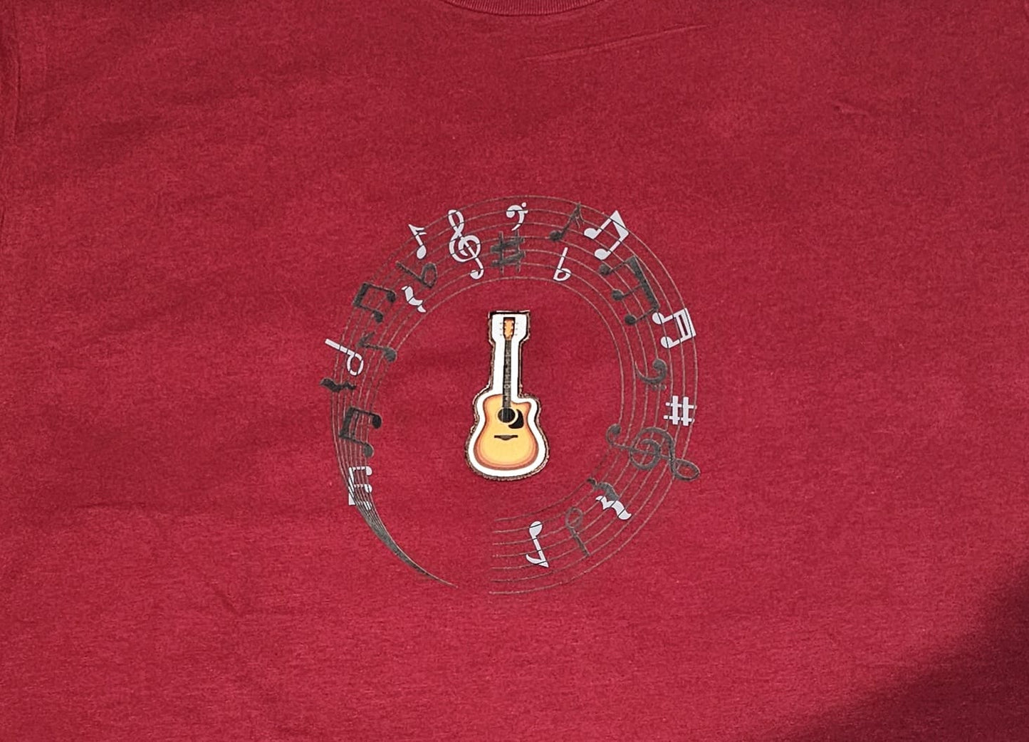 Love music T-Shirt with musical notes and an embroidery guitar patch is loose fit.