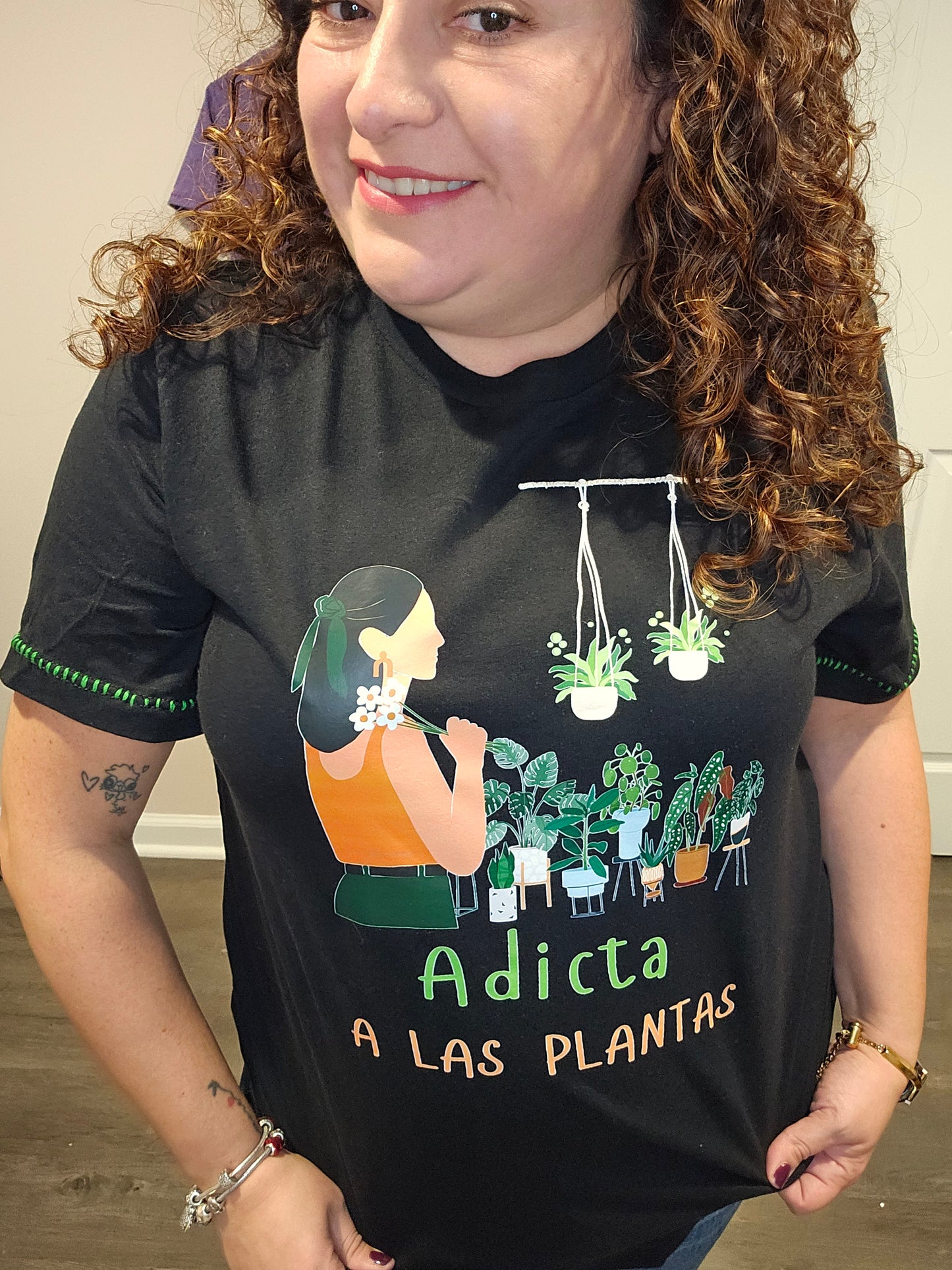 Adicta a las Plantas T -Shirt For The Plant Lady or a the perfect gift. "A unique shirt featuring intricate stitching details, adding a touch of texture to a classic design."