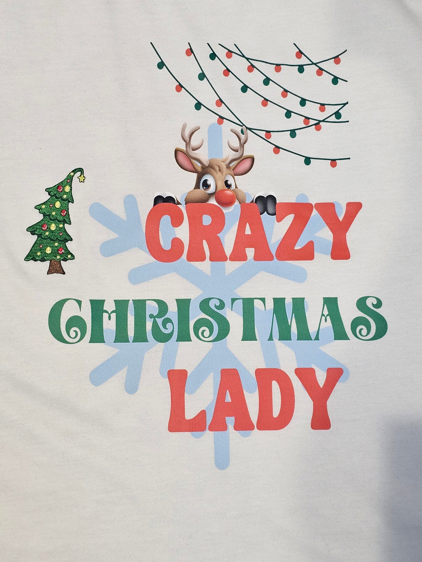 Christmas enthusiast, the "Crazy Christmas Lady T-shirt adorned with a embroidered patch of a xmas tree.