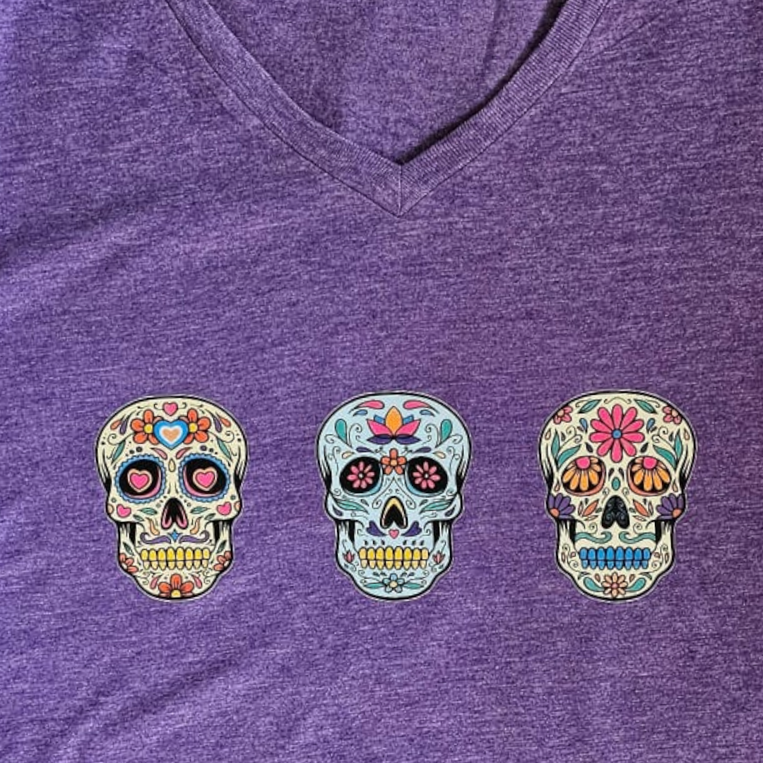 3 Colorful Sugar Calaveras fitted T-Shirt A unique shirt featuring intricate stitching details, adding a touch of texture to a classic design.